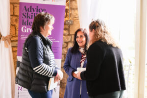 Women laughing at NSBS Women in Networking meeting